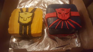Bumbleebee and Optimus Prime cakes side by side