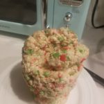 Rice krispy treats carved into a fist.