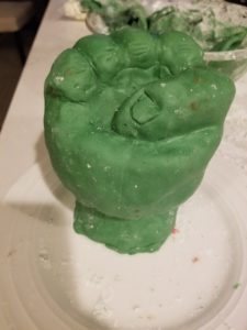 Hulk fist after the leftover fondant has been trimmed